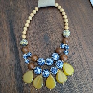 Elegant Beaded Necklace with Yellow and Blue Accents